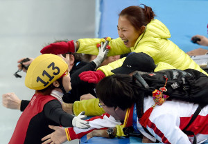 Li Yan (top) celebrates another gold medal