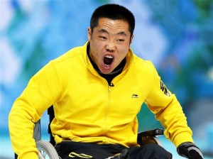 Liu Wei celebrates a rare positive moment on the final day of the curling competition